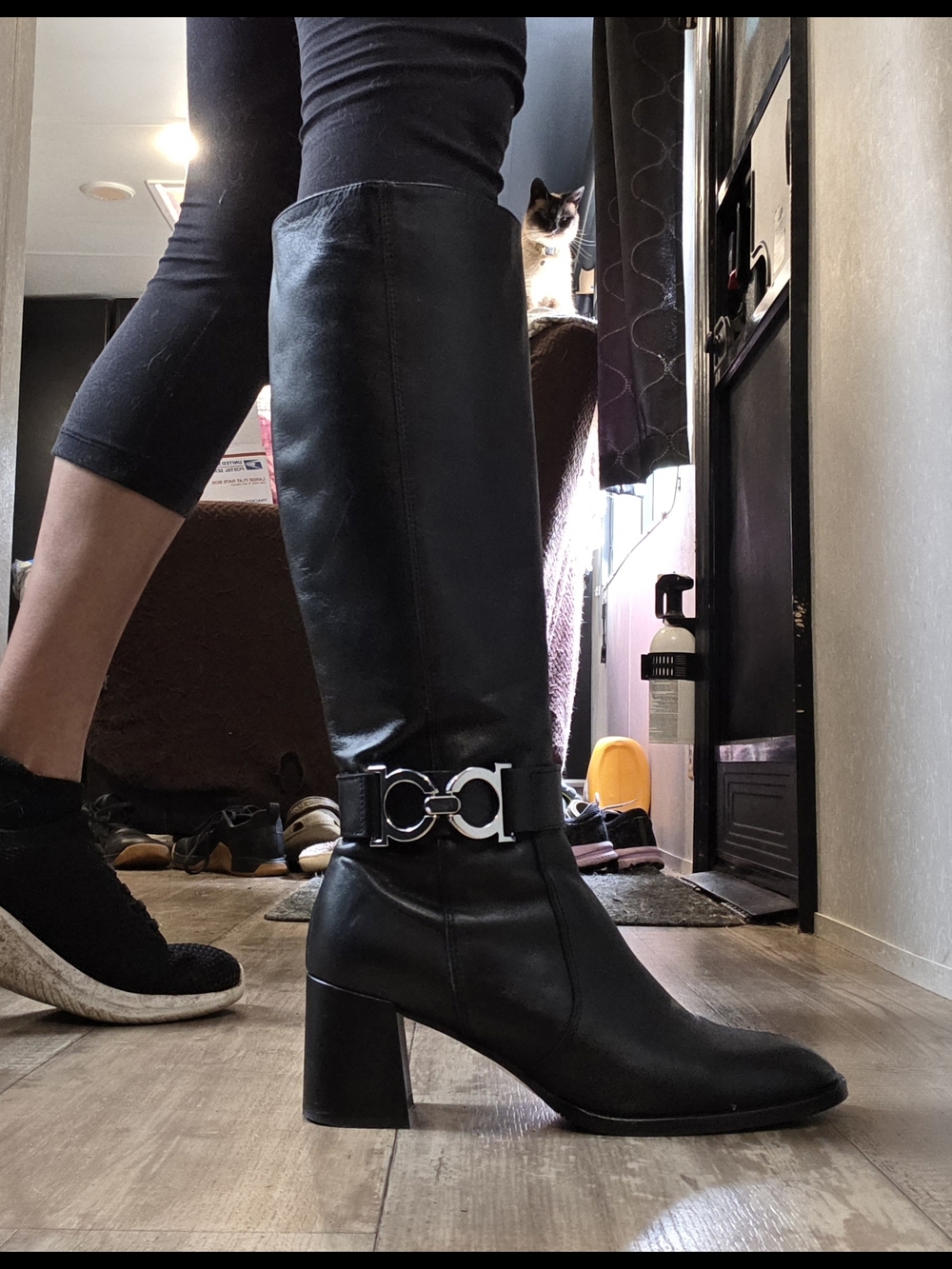 Women's Black Knee-High Heeled Boots with Silver Chain Accent